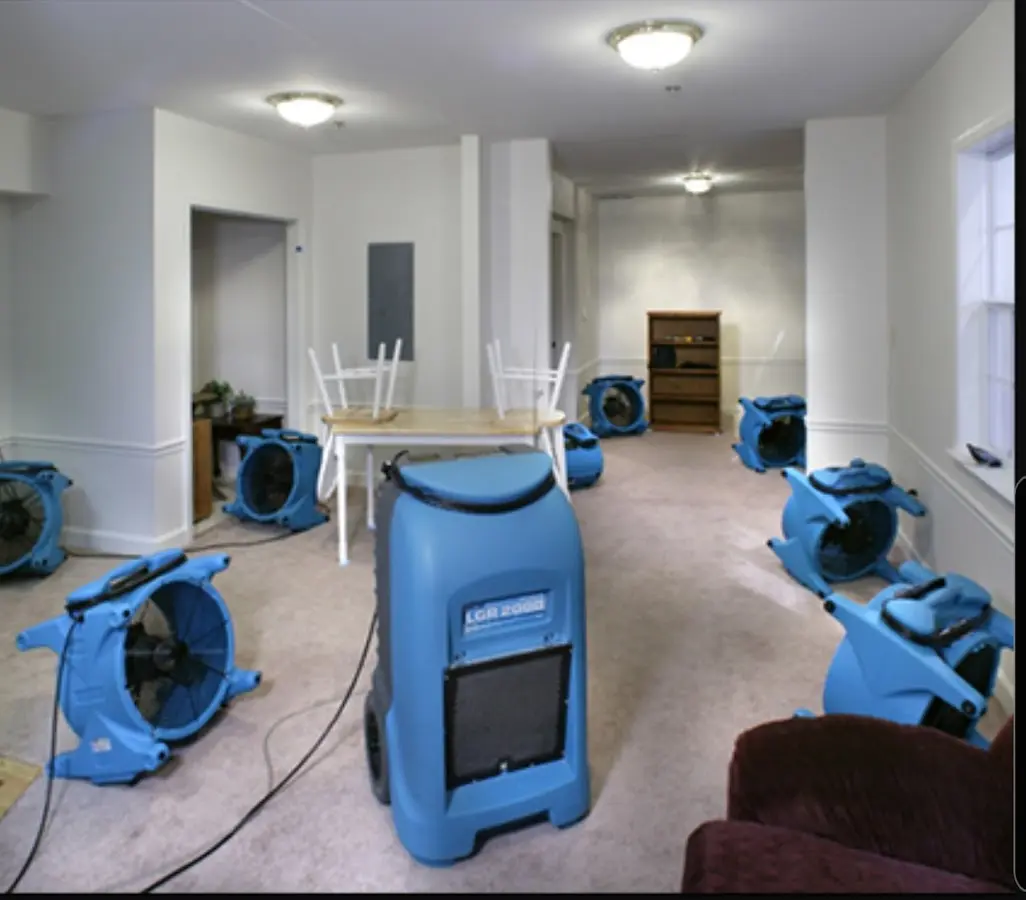 Air movers and dehumidifier setup for Water Damage Restoration in Falmouth